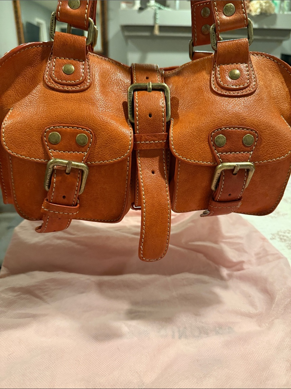 Coccinelle Double-Pocket Leather Shoulder Bag in Cognac Orange